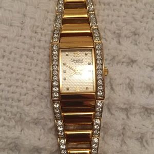 Caravelle by Bulova Goldtone Link Watch with CZ Accents fits 6.5” wrist